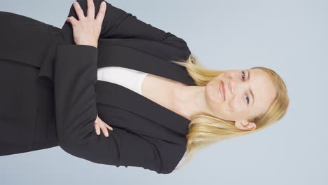 Vertical-video-of-Business-woman-giving-positive-affirmation-looking-at-camera.